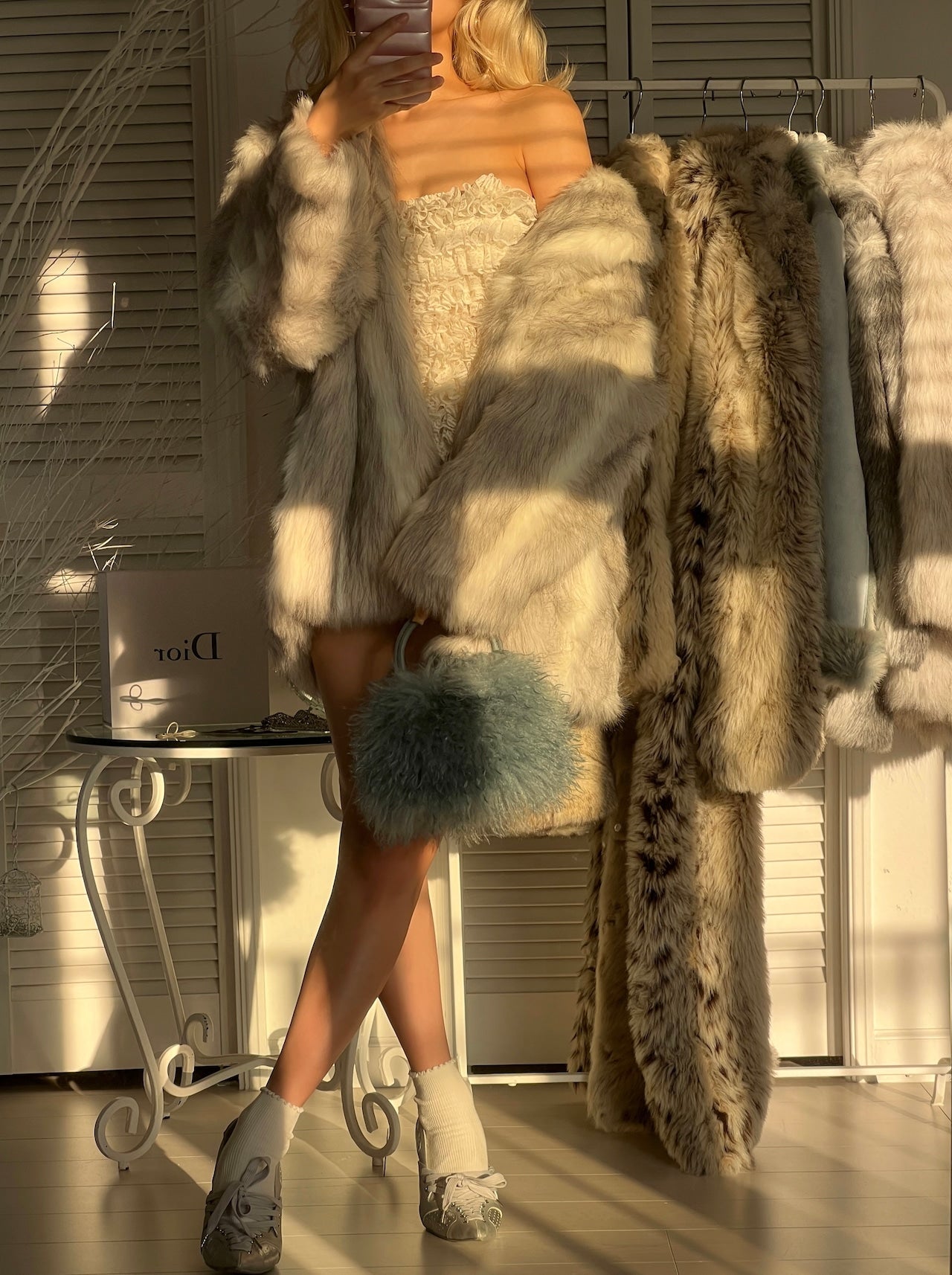 The EXCLUSIVE white faux fox fur coat