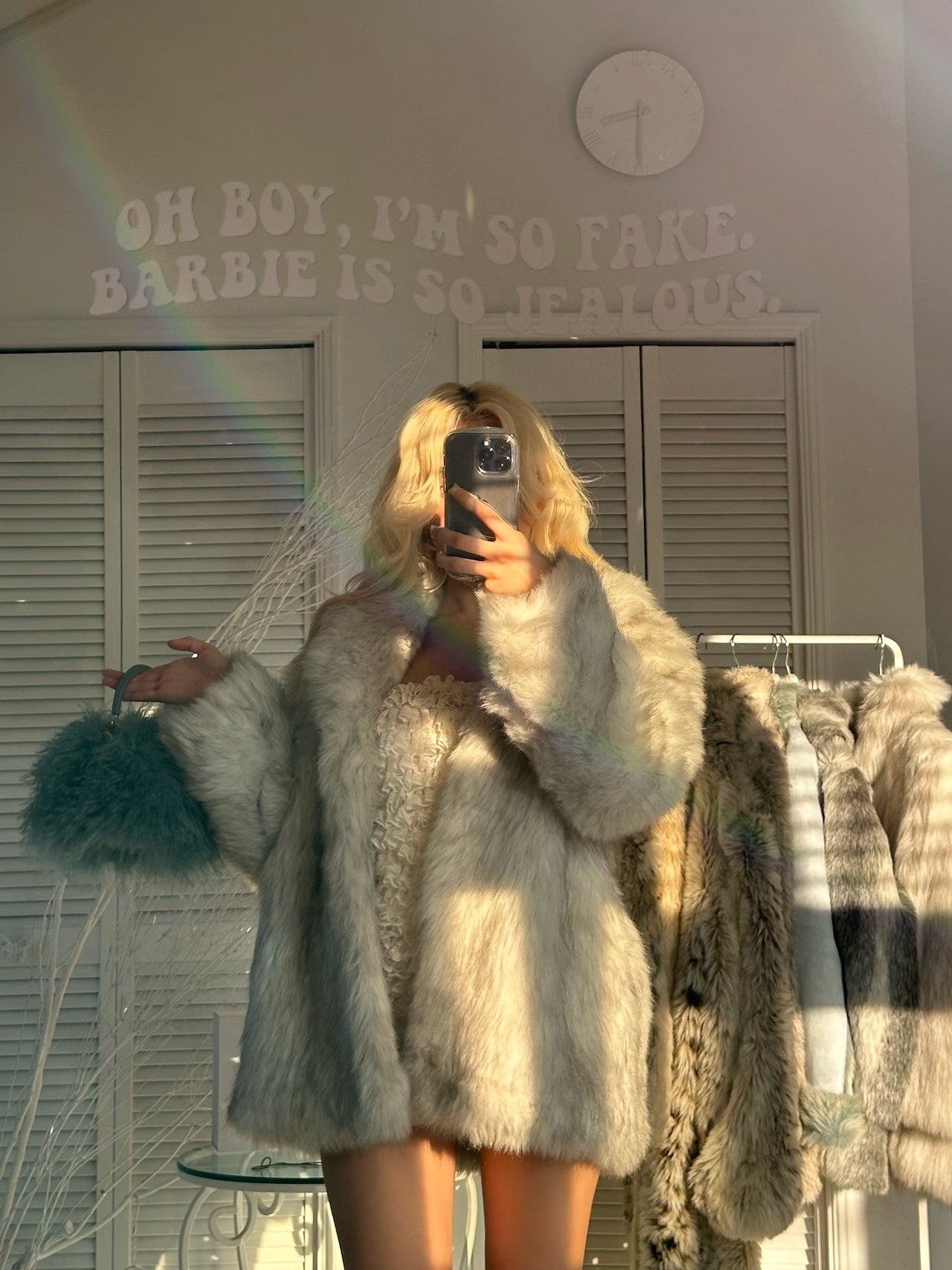 Luxurious fake white fox fur coat