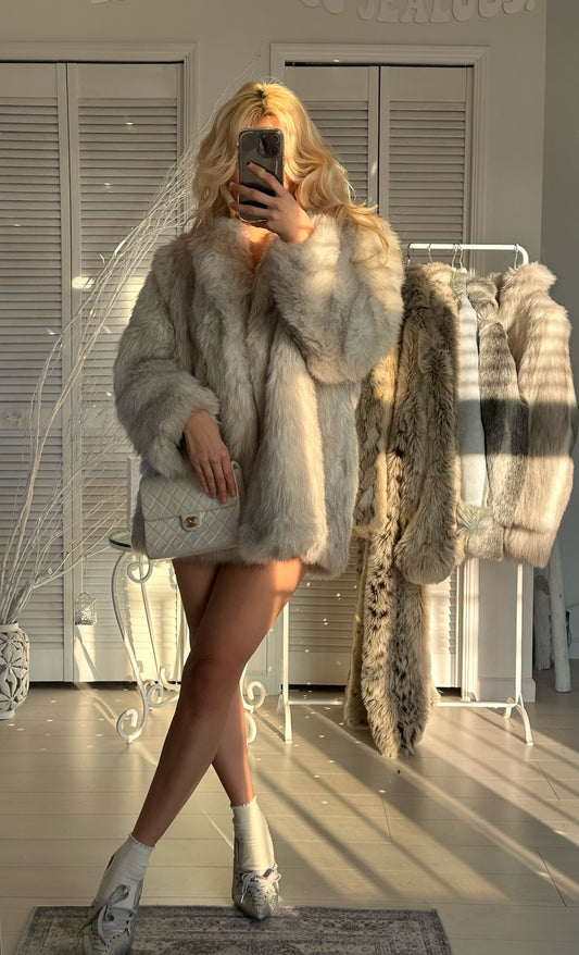 Luxurious fake white fox fur coat