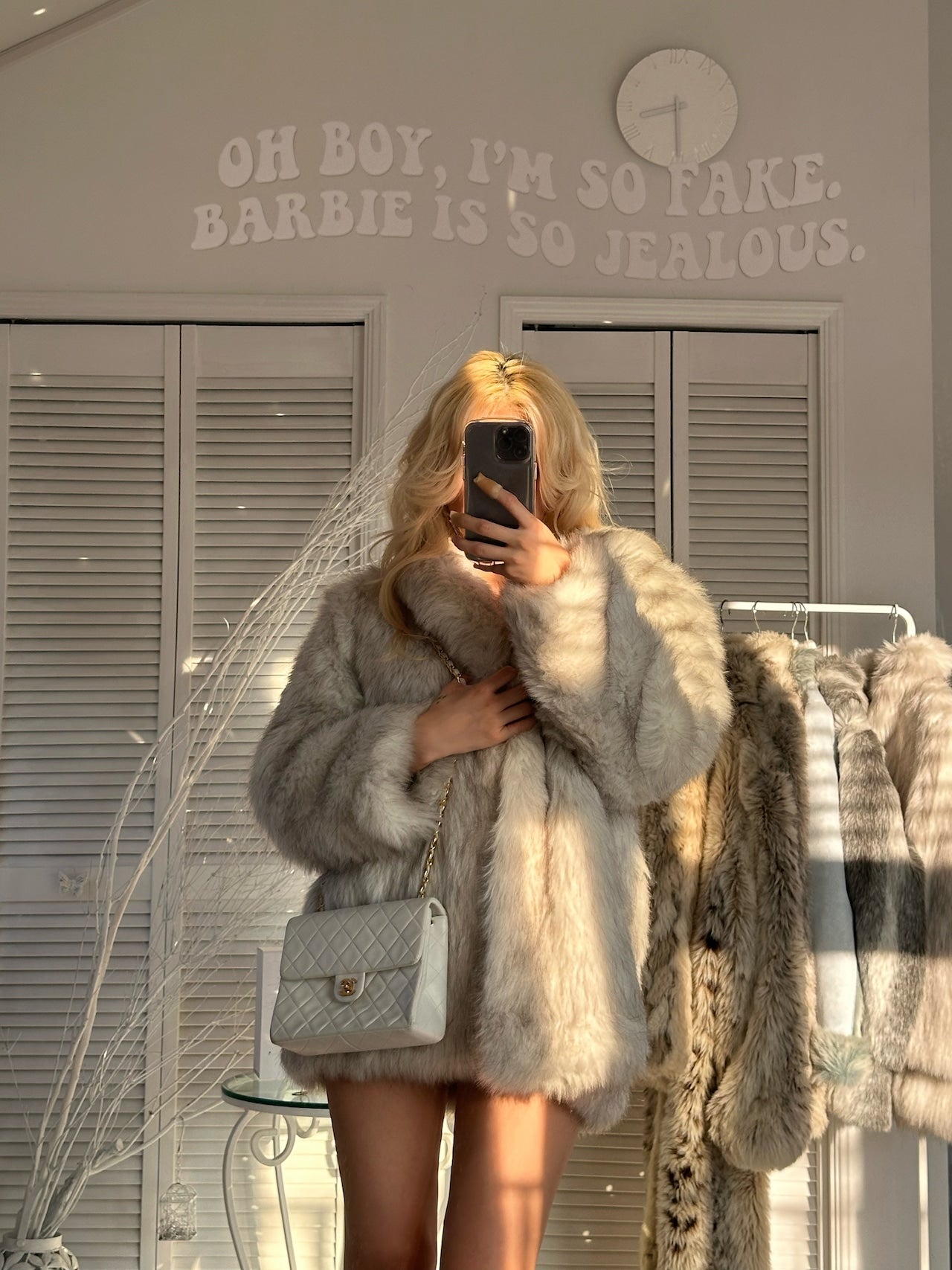 Luxurious fake white fox fur coat