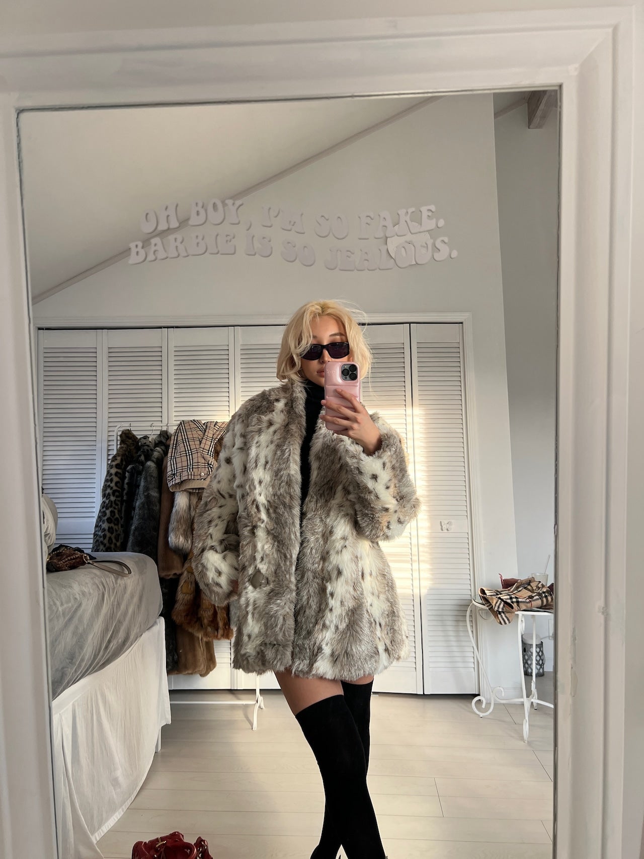 The snow cheetah faux fur coat