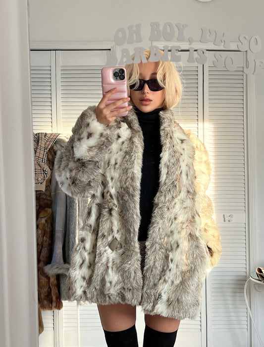 The snow cheetah faux fur coat