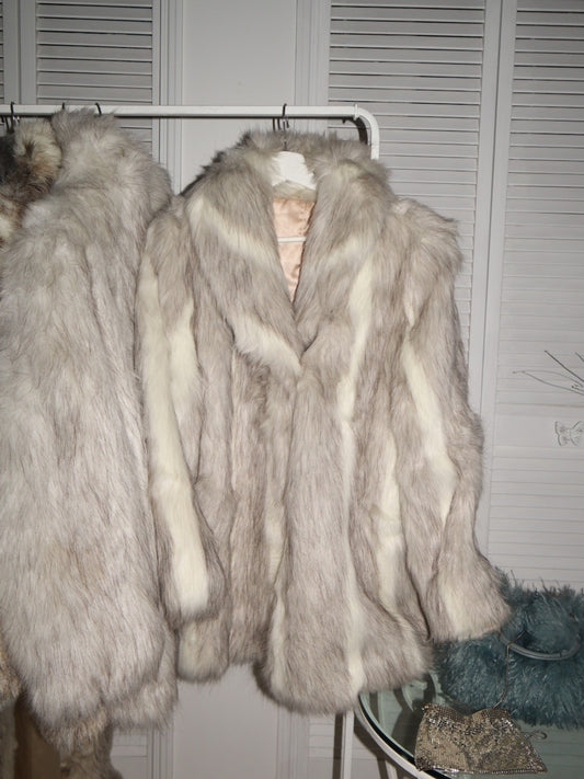 The EXCLUSIVE white faux fox fur coat